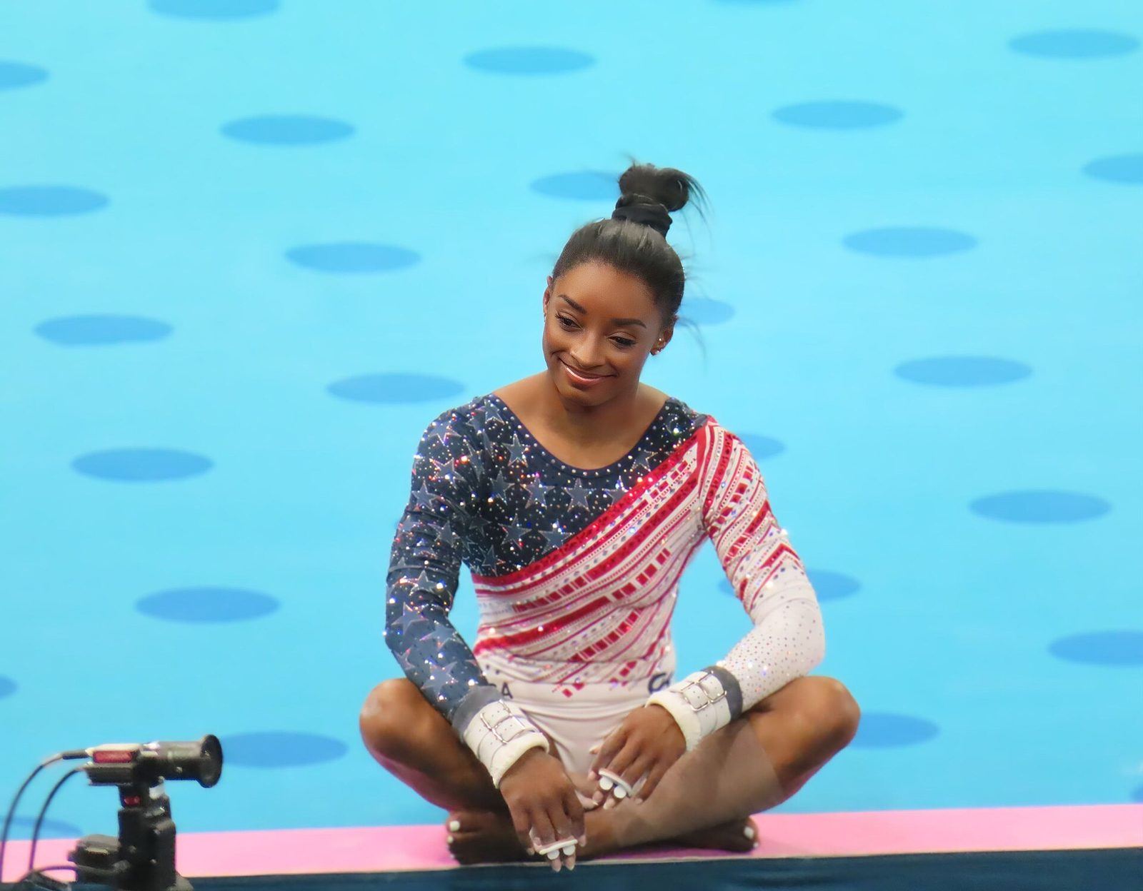Simone Biles competing in gymnastics